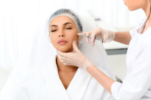 a client receiving cheek injections at The Skin Clinics